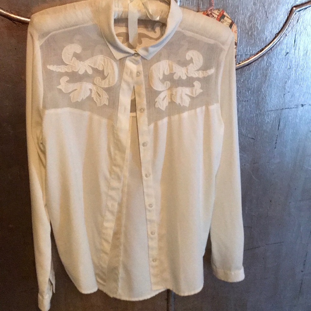 Creme blouse with lace leaves